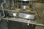 Used US Bottlers VA-32 Rotary Vacuum Filler chassis, not equipped with nozzles or change parts. SELLING PRICE AS IS, WHERE IS, SANFORD, NC.