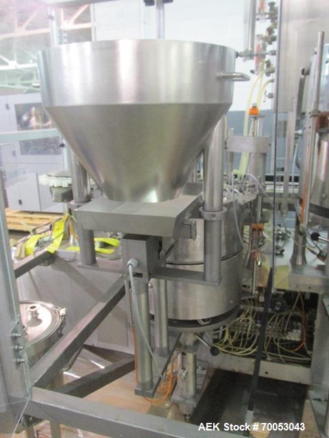 Used Used TL Bosch vial filling line, model MLF3002 filler, with 48" diameter accumulation table, vial air cleaner station, 4 head filling station, stopper inserter and capper stations with bowl feed...