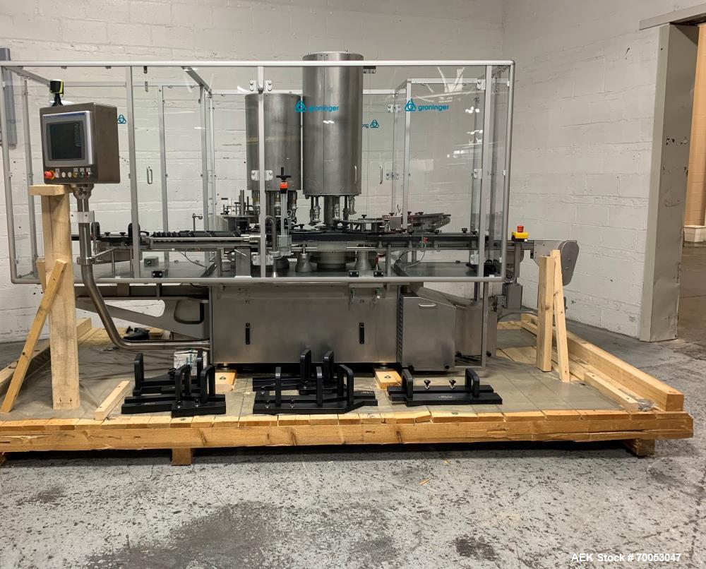Used Used Groninger inserter capper, Model KVK 206, speeds up to 10000 BPH(166 BPM), with (2) 6 head stations, currently set up with (6) head dropper inserter, and (6) head capper stations, 30 - 230 ...