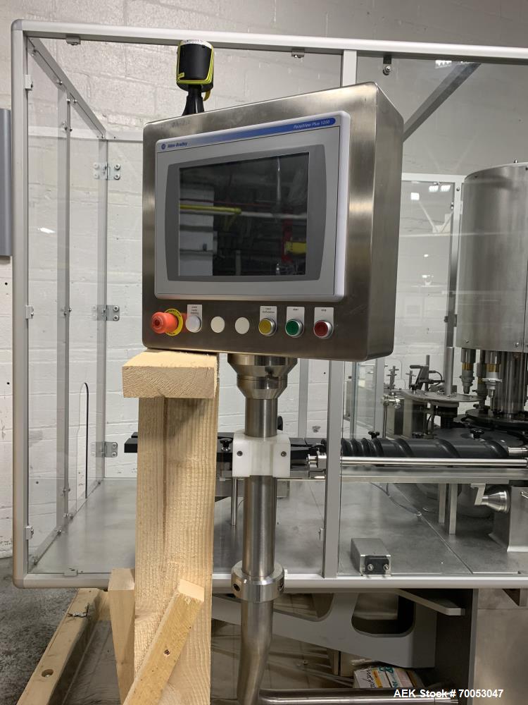 Used Used Groninger inserter capper, Model KVK 206, speeds up to 10000 BPH(166 BPM), with (2) 6 head stations, currently set up with (6) head dropper inserter, and (6) head capper stations, 30 - 230 ...