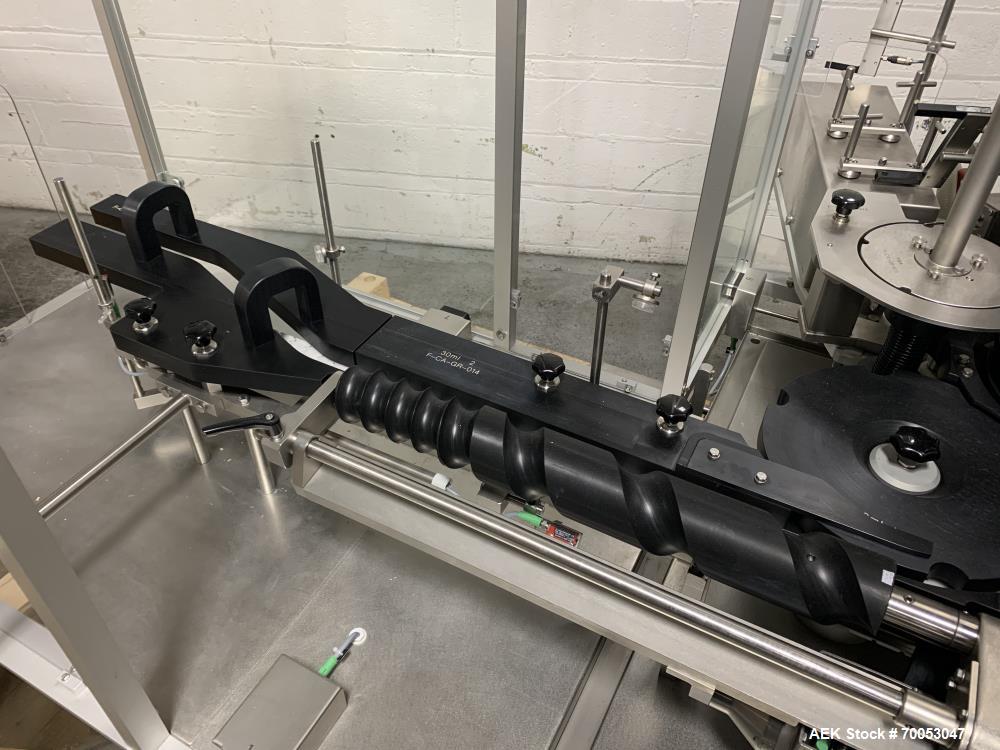 Used Used Groninger inserter capper, Model KVK 206, speeds up to 10000 BPH(166 BPM), with (2) 6 head stations, currently set up with (6) head dropper inserter, and (6) head capper stations, 30 - 230 ...