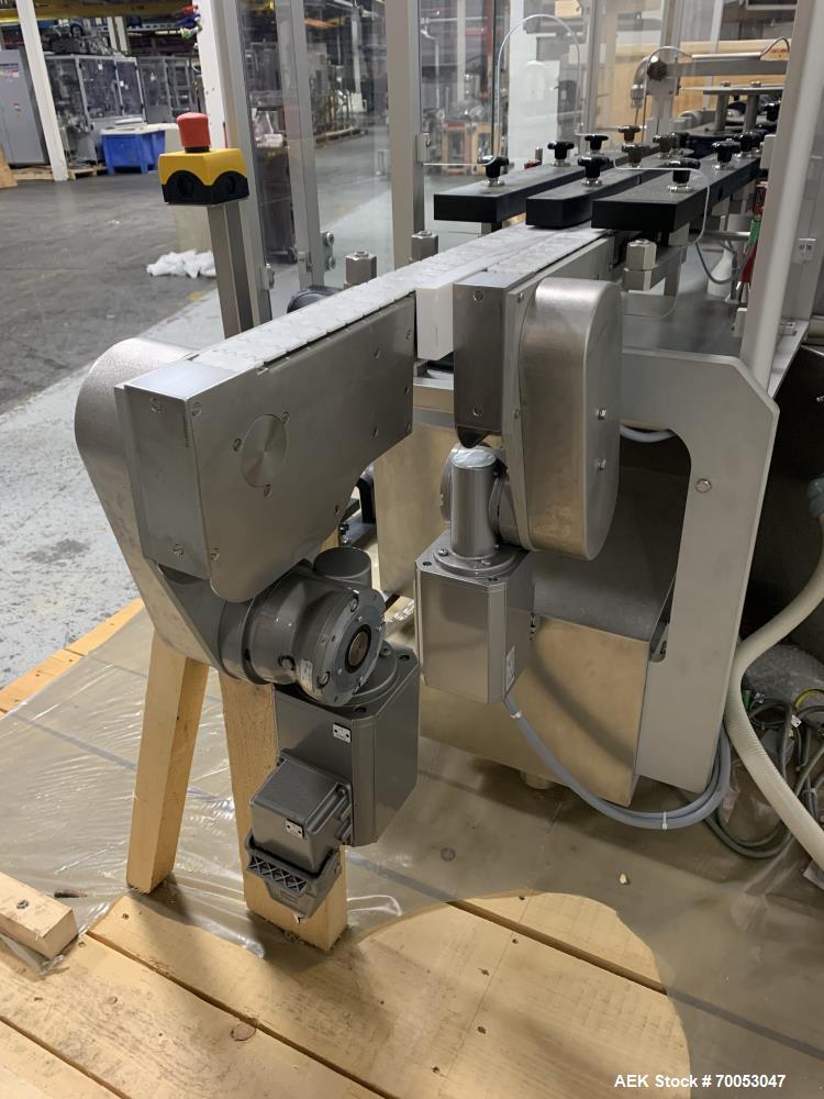 Used Used Groninger inserter capper, Model KVK 206, speeds up to 10000 BPH(166 BPM), with (2) 6 head stations, currently set up with (6) head dropper inserter, and (6) head capper stations, 30 - 230 ...