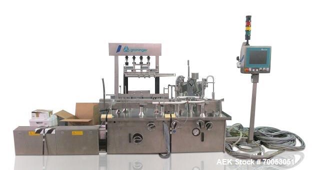 Used Used Groninger filling line, consisting of model KFVG 4211A Groniger filler, plugger, capper, with (4) piston filling station, bowl feeders with plugs and caps, bottle feed station with accumula...