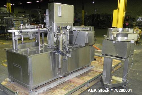 Used Bosch TL Systems Monoblock Vial Filler & Stoppering Machine. Consists of an 8 head rolling diaphram type filler, vial indexing system and stopper inserter. Has 8 filling heads with a filling rat...