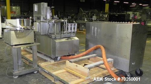 Used Bosch TL Systems Monoblock Vial Filler & Stoppering Machine. Consists of an 8 head rolling diaphram type filler, vial indexing system and stopper inserter. Has 8 filling heads with a filling rat...