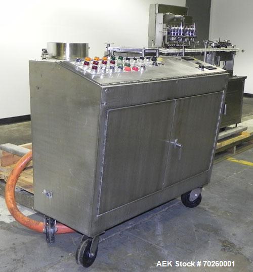 Used Bosch TL Systems Monoblock Vial Filler & Stoppering Machine. Consists of an 8 head rolling diaphram type filler, vial indexing system and stopper inserter. Has 8 filling heads with a filling rat...