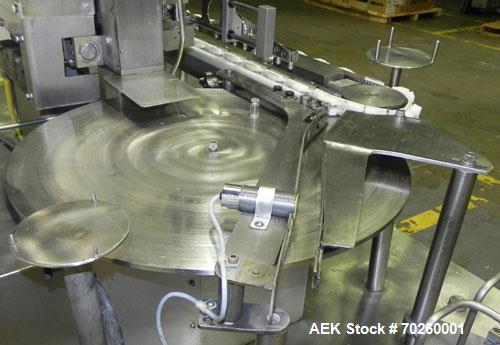 Used Bosch TL Systems Monoblock Vial Filler & Stoppering Machine. Consists of an 8 head rolling diaphram type filler, vial indexing system and stopper inserter. Has 8 filling heads with a filling rat...
