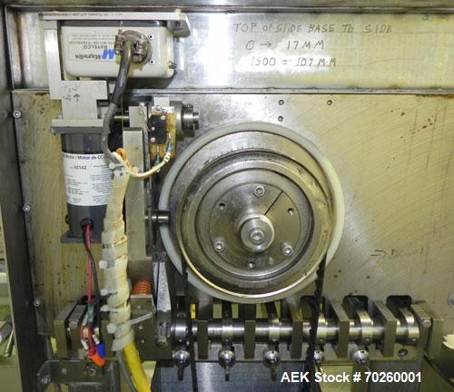 Used Bosch TL Systems Monoblock Vial Filler & Stoppering Machine. Consists of an 8 head rolling diaphram type filler, vial indexing system and stopper inserter. Has 8 filling heads with a filling rat...