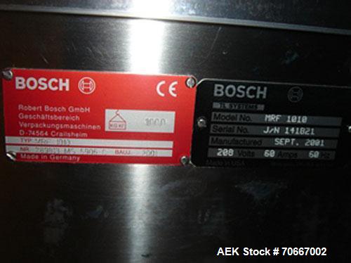 Used Bosch MRF1010 Vial filler capable of speeds up to 70 vials per minute. Fill range:  0.5 ml - 250 ml (with changeparts). Pump Type:  rolling diaphragm.  Stopper size range:  13 mm - 28 mm all typ...