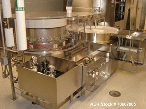 Used Bosch Vial Filling Line consisting of Bosch RRN 2020 vial washer capable of speeds up to 130 vials per minute.Max Container Size:Diameter up to 52 mm, Height up to 110 mm. Last ran vials of 2, 5...