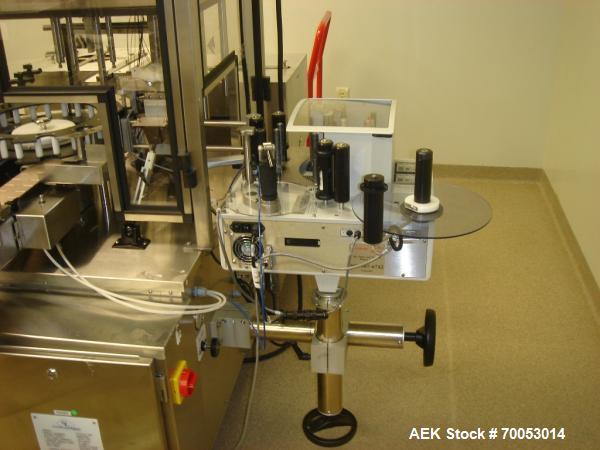 Used Chase Logeman Monoblock Filling Line, Model FPCCL4-12H.  Designed to fill, plug, cap and label at speeds up to 60 containers/minute; fill range from 1 - 125 mL; cap size range from 8 - 32 mm; IM...