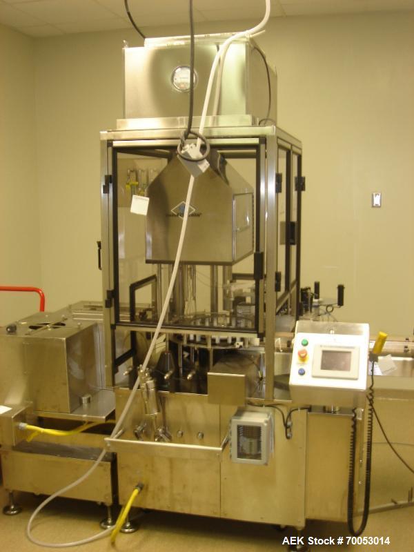 Used Chase Logeman Monoblock Filling Line, Model FPCCL4-12H.  Designed to fill, plug, cap and label at speeds up to 60 containers/minute; fill range from 1 - 125 mL; cap size range from 8 - 32 mm; IM...