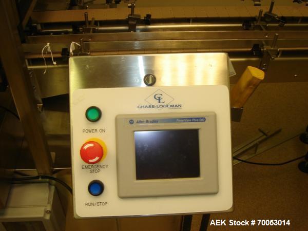 Used Chase Logeman Monoblock Filling Line, Model FPCCL4-12H.  Designed to fill, plug, cap and label at speeds up to 60 containers/minute; fill range from 1 - 125 mL; cap size range from 8 - 32 mm; IM...