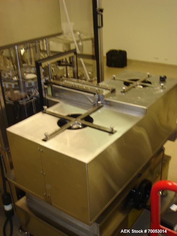 Used Chase Logeman Monoblock Filling Line, Model FPCCL4-12H.  Designed to fill, plug, cap and label at speeds up to 60 containers/minute; fill range from 1 - 125 mL; cap size range from 8 - 32 mm; IM...