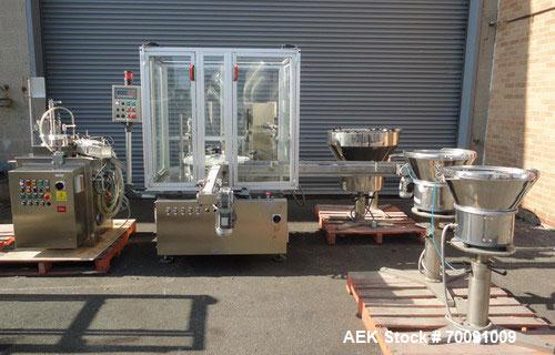 Used Comas Liquid Vial Filler and Capper Monoblock Liquid Filler, Powder Filler RP, Model FC7-50. 3000-4000 parts per hour. This unit has main monoblock with 4 head piston filling mechanism and screw...
