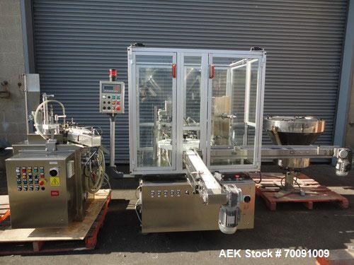 Used Comas Liquid Vial Filler and Capper Monoblock Liquid Filler, Powder Filler RP, Model FC7-50. 3000-4000 parts per hour. This unit has main monoblock with 4 head piston filling mechanism and screw...