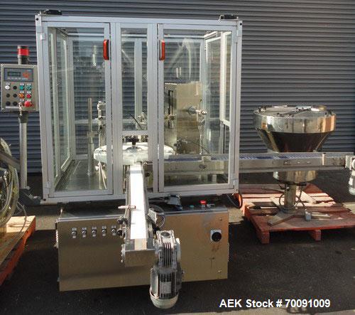 Used Comas Liquid Vial Filler and Capper Monoblock Liquid Filler, Powder Filler RP, Model FC7-50. 3000-4000 parts per hour. This unit has main monoblock with 4 head piston filling mechanism and screw...