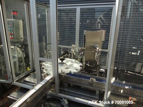 Used Comas Liquid Vial Filler and Capper Monoblock Liquid Filler, Powder Filler RP, Model FC7-50. 3000-4000 parts per hour. This unit has main monoblock with 4 head piston filling mechanism and screw...