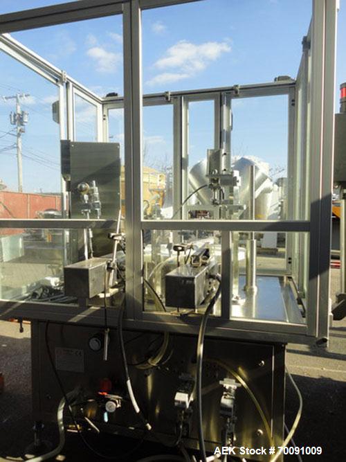 Used Comas Liquid Vial Filler and Capper Monoblock Liquid Filler, Powder Filler RP, Model FC7-50. 3000-4000 parts per hour. This unit has main monoblock with 4 head piston filling mechanism and screw...