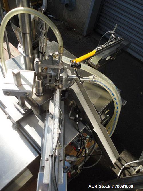 Used Comas Liquid Vial Filler and Capper Monoblock Liquid Filler, Powder Filler RP, Model FC7-50. 3000-4000 parts per hour. This unit has main monoblock with 4 head piston filling mechanism and screw...