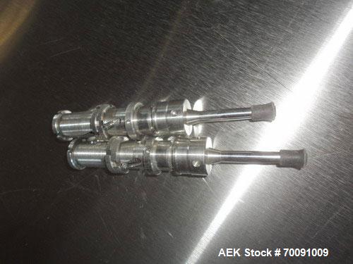 Used Comas Liquid Vial Filler and Capper Monoblock Liquid Filler, Powder Filler RP, Model FC7-50. 3000-4000 parts per hour. This unit has main monoblock with 4 head piston filling mechanism and screw...