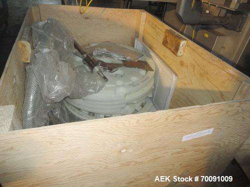 Used Comas Liquid Vial Filler and Capper Monoblock Liquid Filler, Powder Filler RP, Model FC7-50. 3000-4000 parts per hour. This unit has main monoblock with 4 head piston filling mechanism and screw...