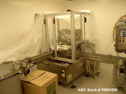 Used Comas Liquid Vial Filler and Capper Monoblock Liquid Filler, Powder Filler RP, Model FC7-50. 3000-4000 parts per hour. This unit has main monoblock with 4 head piston filling mechanism and screw...