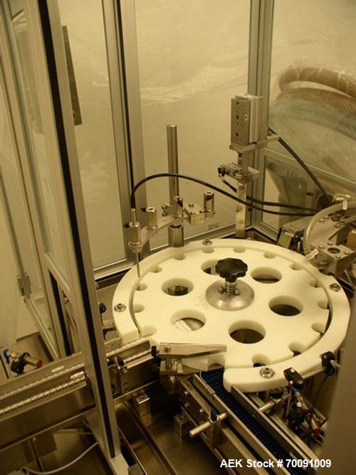 Used Comas Liquid Vial Filler and Capper Monoblock Liquid Filler, Powder Filler RP, Model FC7-50. 3000-4000 parts per hour. This unit has main monoblock with 4 head piston filling mechanism and screw...
