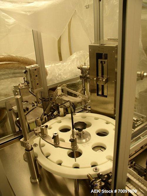 Used Comas Liquid Vial Filler and Capper Monoblock Liquid Filler, Powder Filler RP, Model FC7-50. 3000-4000 parts per hour. This unit has main monoblock with 4 head piston filling mechanism and screw...