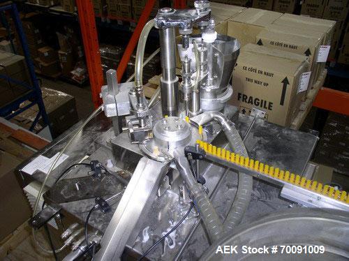 Used Comas Liquid Vial Filler and Capper Monoblock Liquid Filler, Powder Filler RP, Model FC7-50. 3000-4000 parts per hour. This unit has main monoblock with 4 head piston filling mechanism and screw...