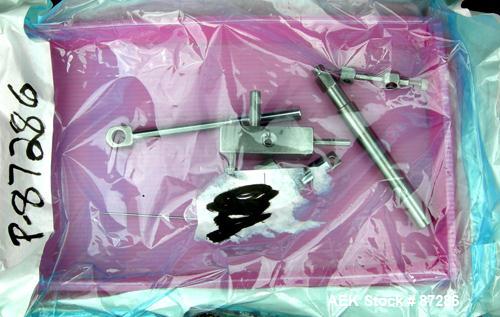 USED: Cozzoli heavy duty table top syringe filler, model F400X. Rated 0 to 50 cycles per minute. Max syringe size of 60ml, filling nozzle range 1.2mm to 6mm. Adjustable volume selector. Accurate with...