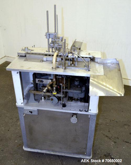 Used Cozzoli FPS1 Automatic Ampoule Filler and Flame Sealer.