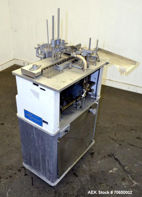 Used Cozzoli FPS1 Automatic Ampoule Filler and Flame Sealer.