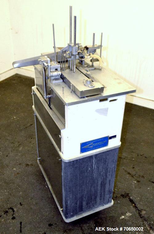Used Cozzoli FPS1 Automatic Ampoule Filler and Flame Sealer.