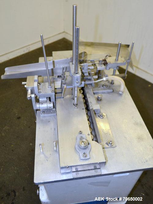 Used Cozzoli FPS1 Automatic Ampoule Filler and Flame Sealer.