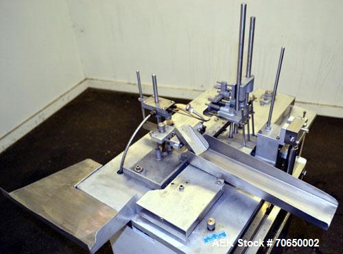 Used Cozzoli FPS1 Automatic Ampoule Filler and Flame Sealer.