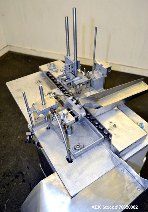 Used Cozzoli FPS1 Automatic Ampoule Filler and Flame Sealer.