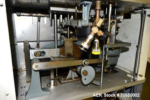 Used Cozzoli FPS1 Automatic Ampoule Filler and Flame Sealer.