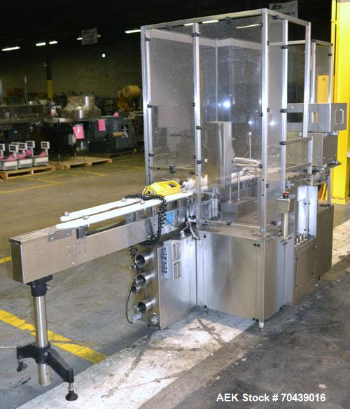 Used Cozzoli VR2S Monoblock Filler and Stoppering Machine. Capable of speeds up to 120 vials per minute. Has four head filler and single bowl stoppering systems (requires changeparts, bowl not includ...