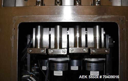 Used Cozzoli VR2S Monoblock Filler and Stoppering Machine. Capable of speeds up to 120 vials per minute. Has four head filler and single bowl stoppering systems (requires changeparts, bowl not includ...