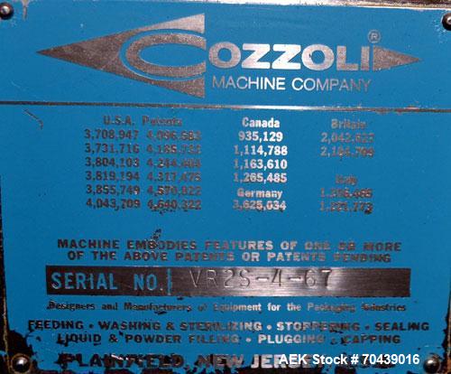 Used Cozzoli VR2S Monoblock Filler and Stoppering Machine. Capable of speeds up to 120 vials per minute. Has four head filler and single bowl stoppering systems (requires changeparts, bowl not includ...