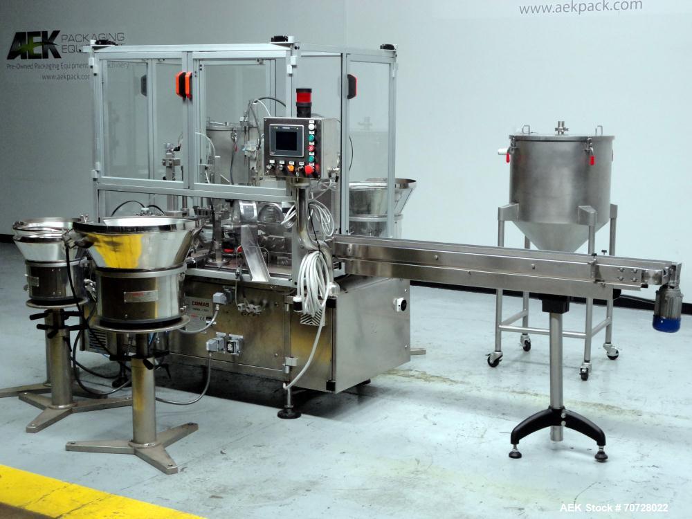 Used Comas Plastic Dispensing Syringe Monoblock Filling System, Model FD120, speeds up to 60 syringes/minute. Dual station index with 2 Ivek Peristaltic product fill pumps, Vibratory Bowl feeders for...