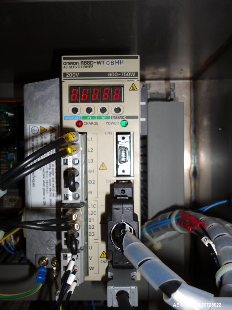 Used Comas Plastic Dispensing Syringe Monoblock Filling System, Model FD120, speeds up to 60 syringes/minute. Dual station index with 2 Ivek Peristaltic product fill pumps, Vibratory Bowl feeders for...