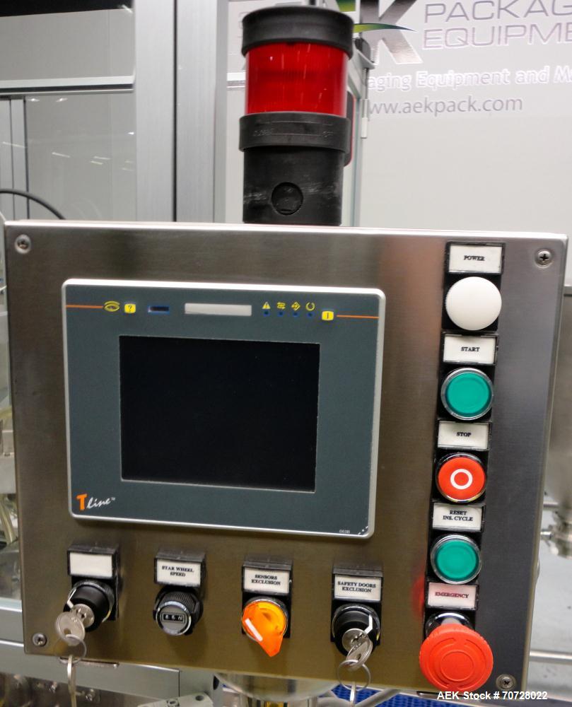 Used Comas Plastic Dispensing Syringe Monoblock Filling System, Model FD120, speeds up to 60 syringes/minute. Dual station index with 2 Ivek Peristaltic product fill pumps, Vibratory Bowl feeders for...