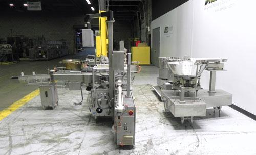 Used Groninger Syringe Filling Line, stainless steel on product contact parts. Line consists of model DFVK4000S inline (4) head filler, RTA3005 filler and HEA100 labeler.