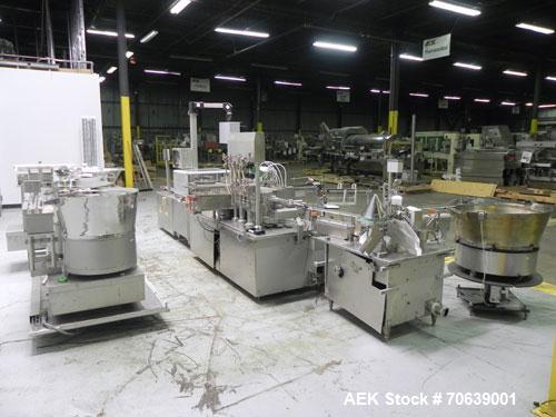 Used Groninger Syringe Filling Line, stainless steel on product contact parts. Line consists of model DFVK4000S inline (4) head filler, RTA3005 filler and HEA100 labeler.
