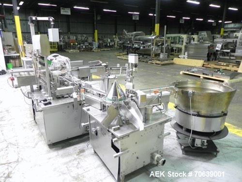 Used Groninger Syringe Filling Line, stainless steel on product contact parts. Line consists of model DFVK4000S inline (4) head filler, RTA3005 filler and HEA100 labeler.