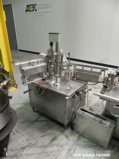 Used Groninger Syringe Filling Line, stainless steel on product contact parts. Line consists of model DFVK4000S inline (4) head filler, RTA3005 filler and HEA100 labeler.
