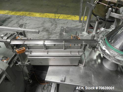Used Groninger Syringe Filling Line, stainless steel on product contact parts. Line consists of model DFVK4000S inline (4) head filler, RTA3005 filler and HEA100 labeler.