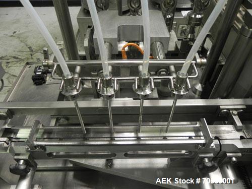 Used Groninger Syringe Filling Line, stainless steel on product contact parts. Line consists of model DFVK4000S inline (4) head filler, RTA3005 filler and HEA100 labeler.